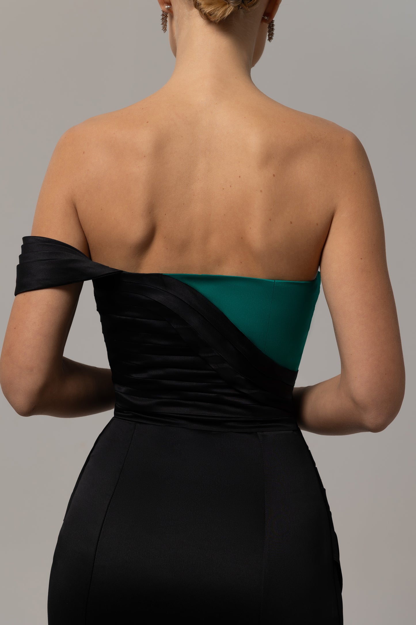 Off-shoulder satin gown with split skirt