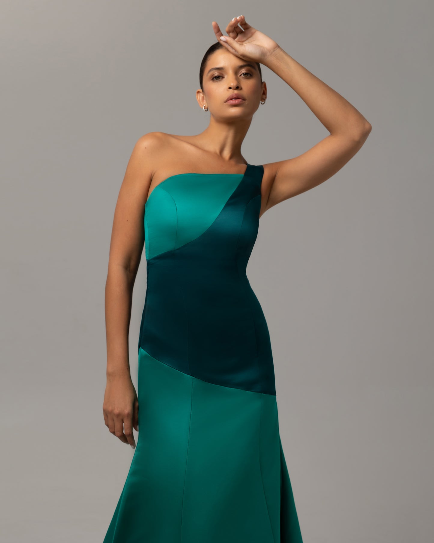 Asymmetric neckline panel gown