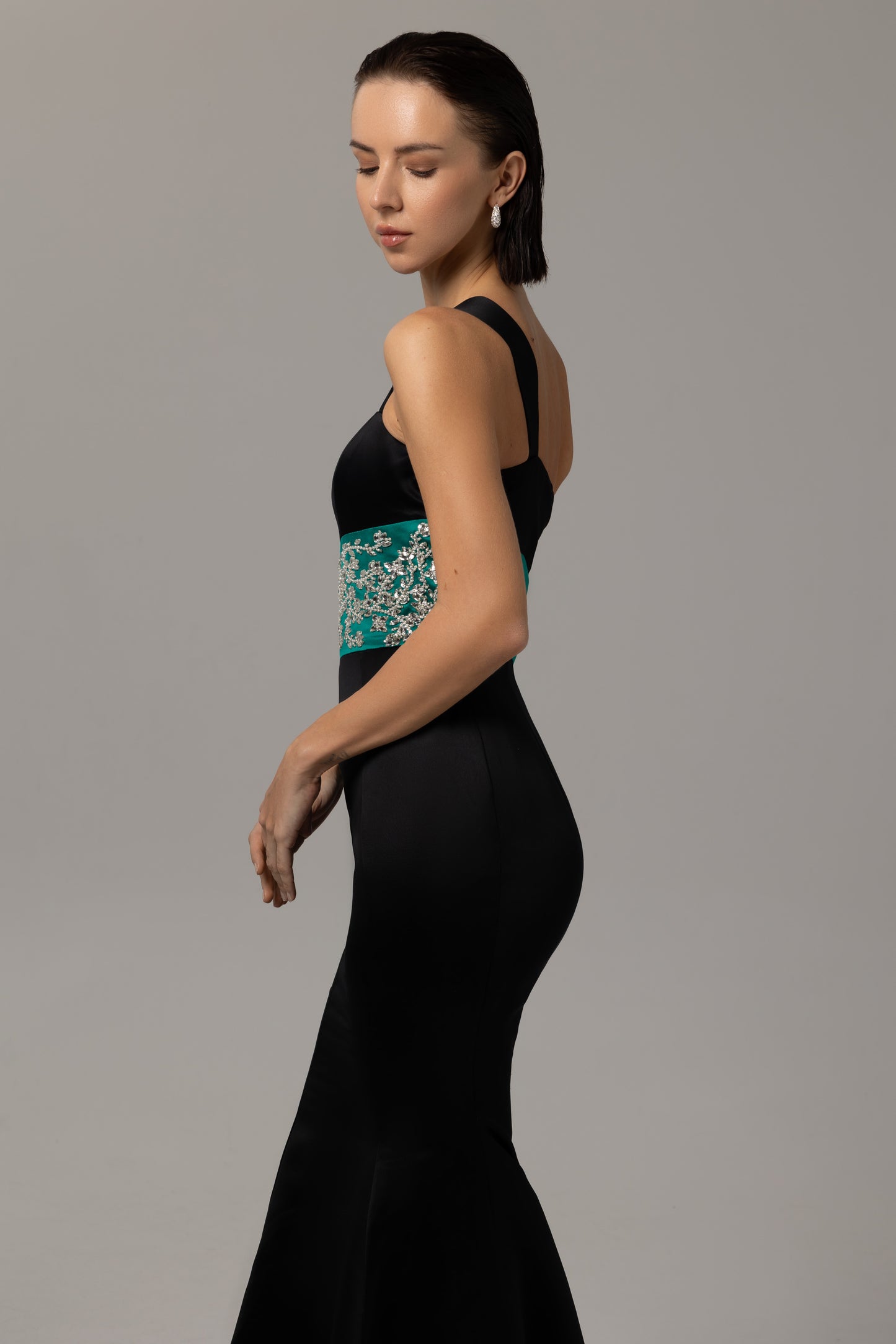Evening gown with mermaid train and sparkling details