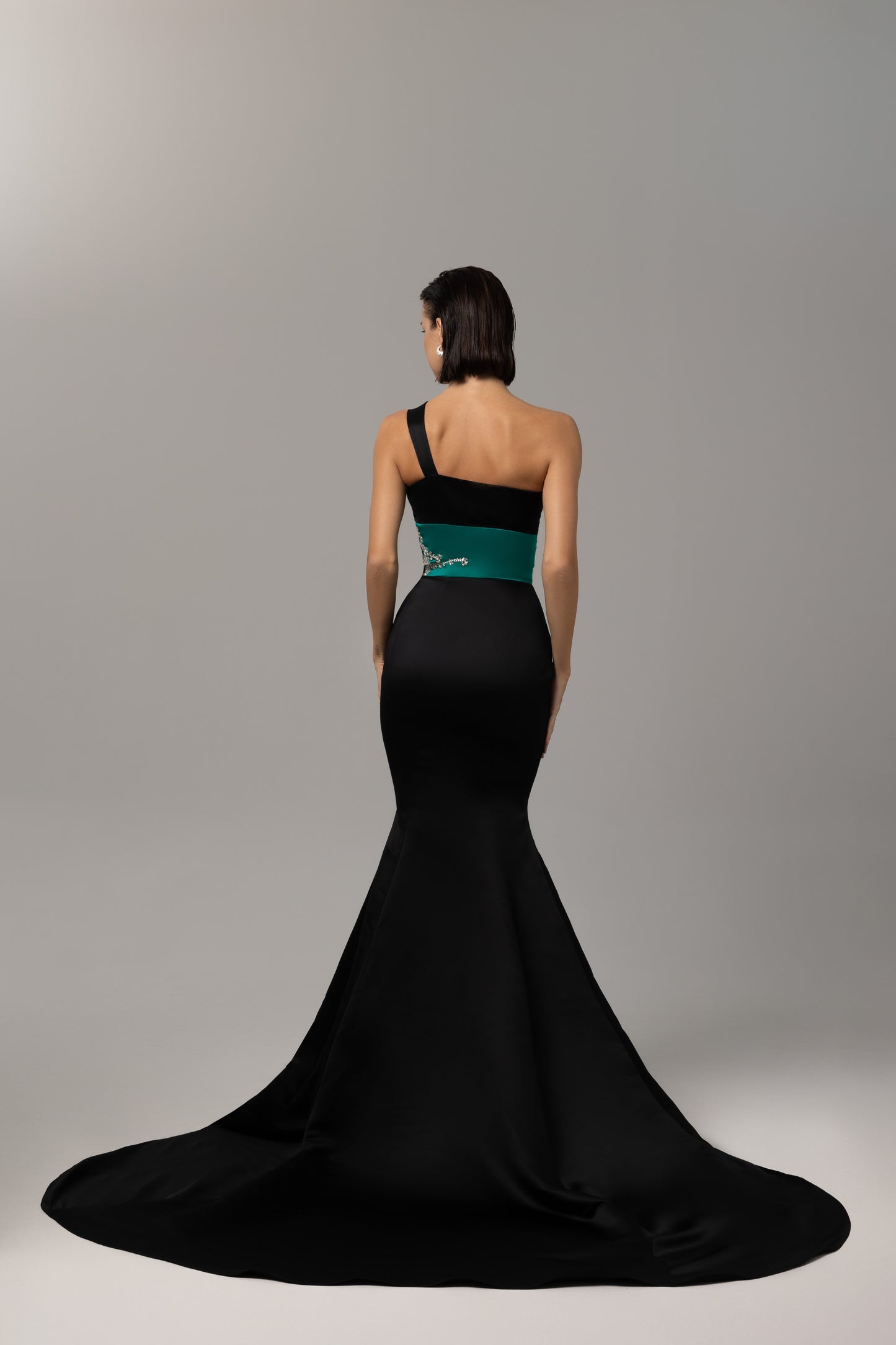 Embellished mermaid train evening gown