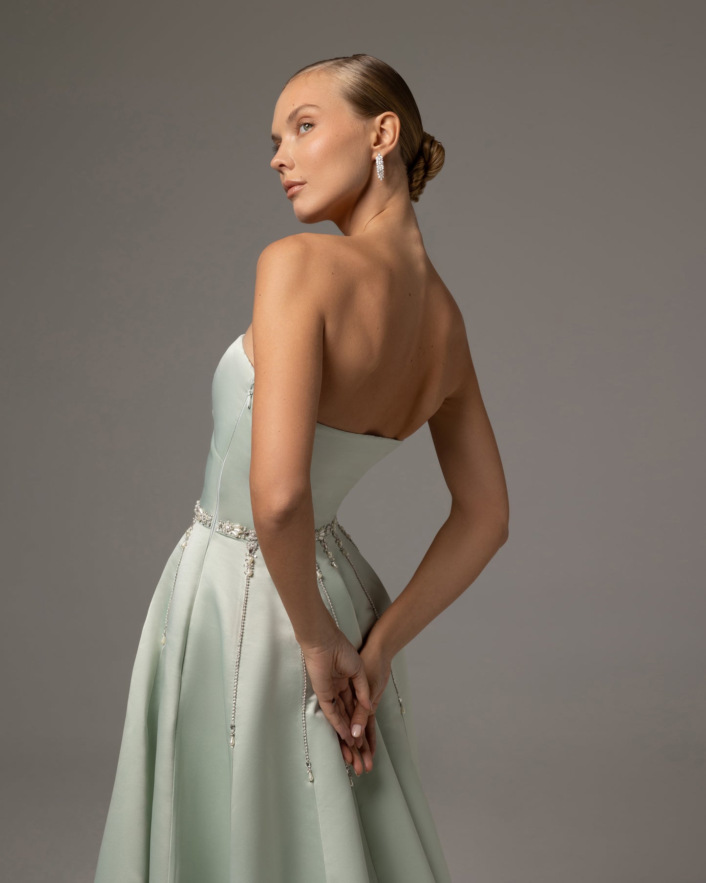Boned bodice strapless satin gown