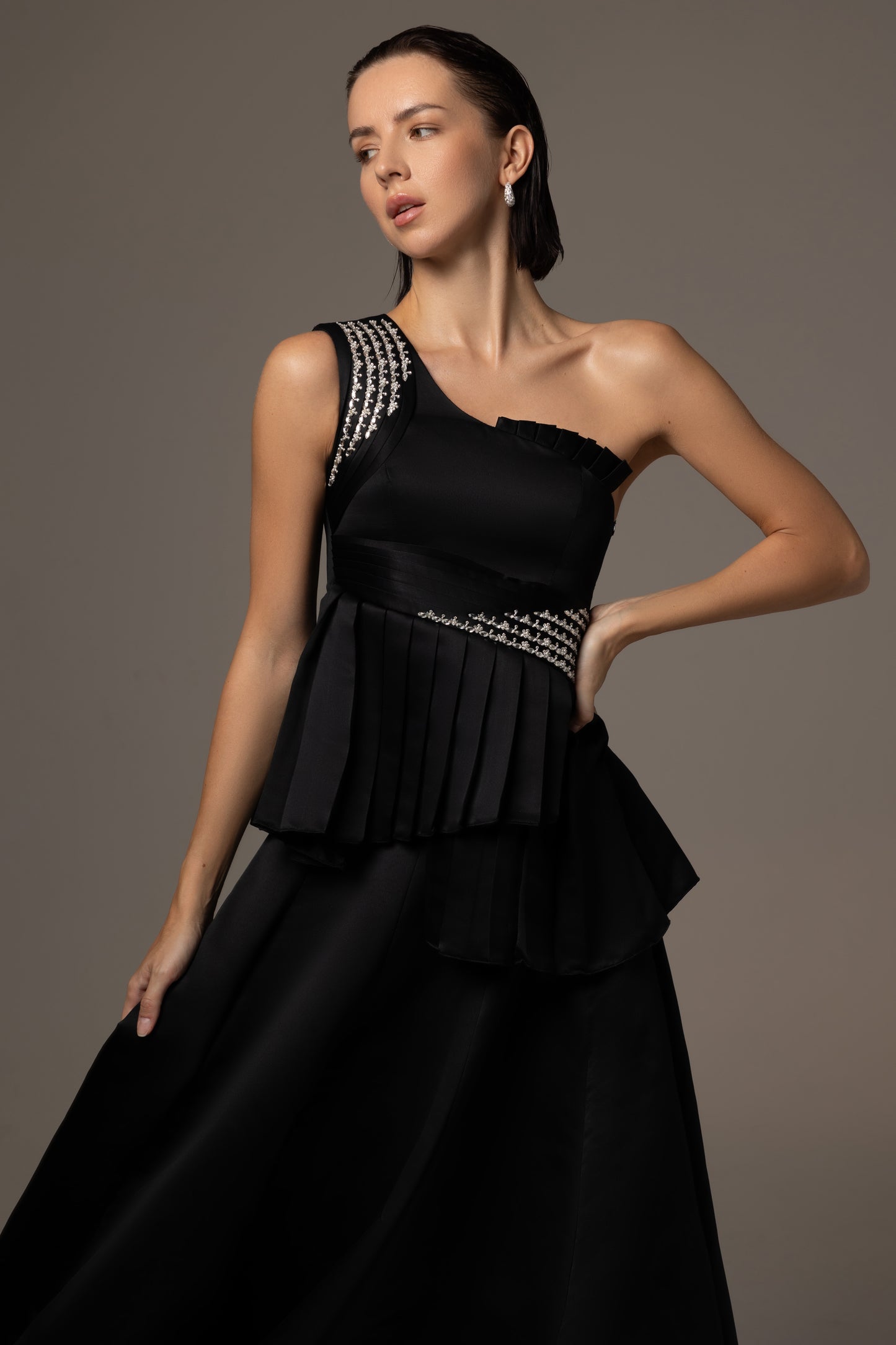 Asymmetrical pleated crystal gown